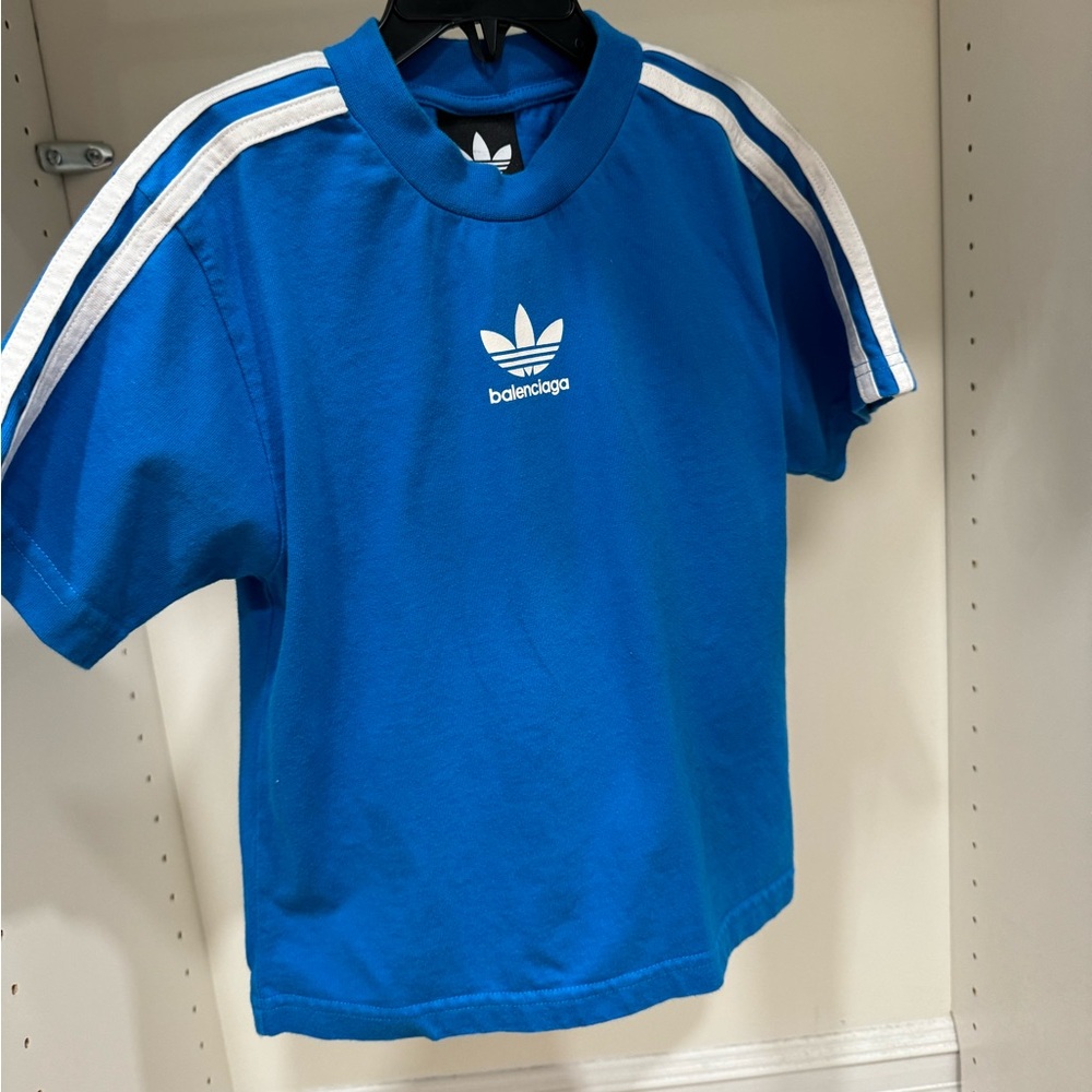 Balenciaga shirt size 6Y. The color is blue and white.